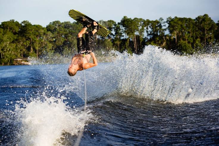 Student wakeboarding on Lake Virginia.