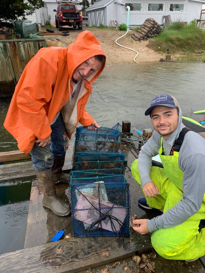 Colin Kelly ’21 works to grow oysters as part of his marine biology internship in upstate New York.