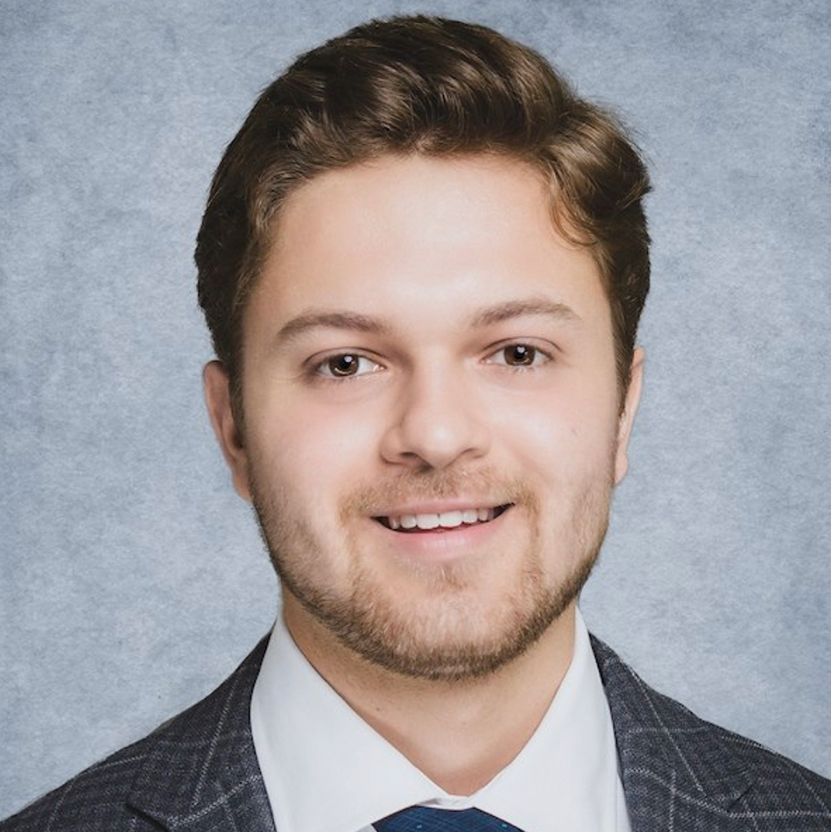 A headshot of Giovanni Figueiredo