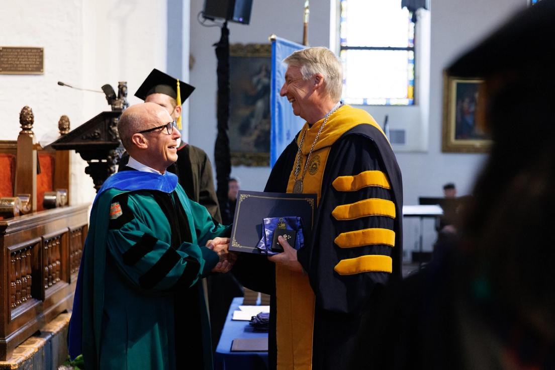 Rollins president Grant Cornwell and political science professor Don Davison at the Phi Beta Kappa induction ceremony.