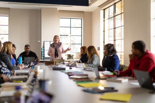 A professor leads a classroom discussion.