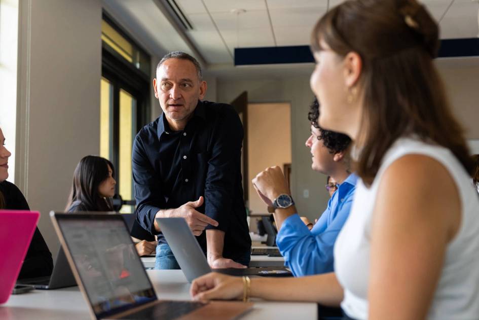 An international relations professor leads a class discussion at Rollins.