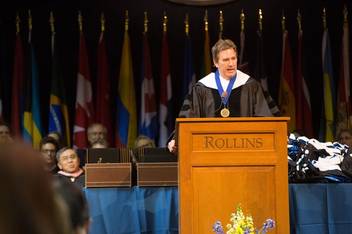 Rick Goings, chair of the 91 Board of Trustees, delivers an address at commencement.