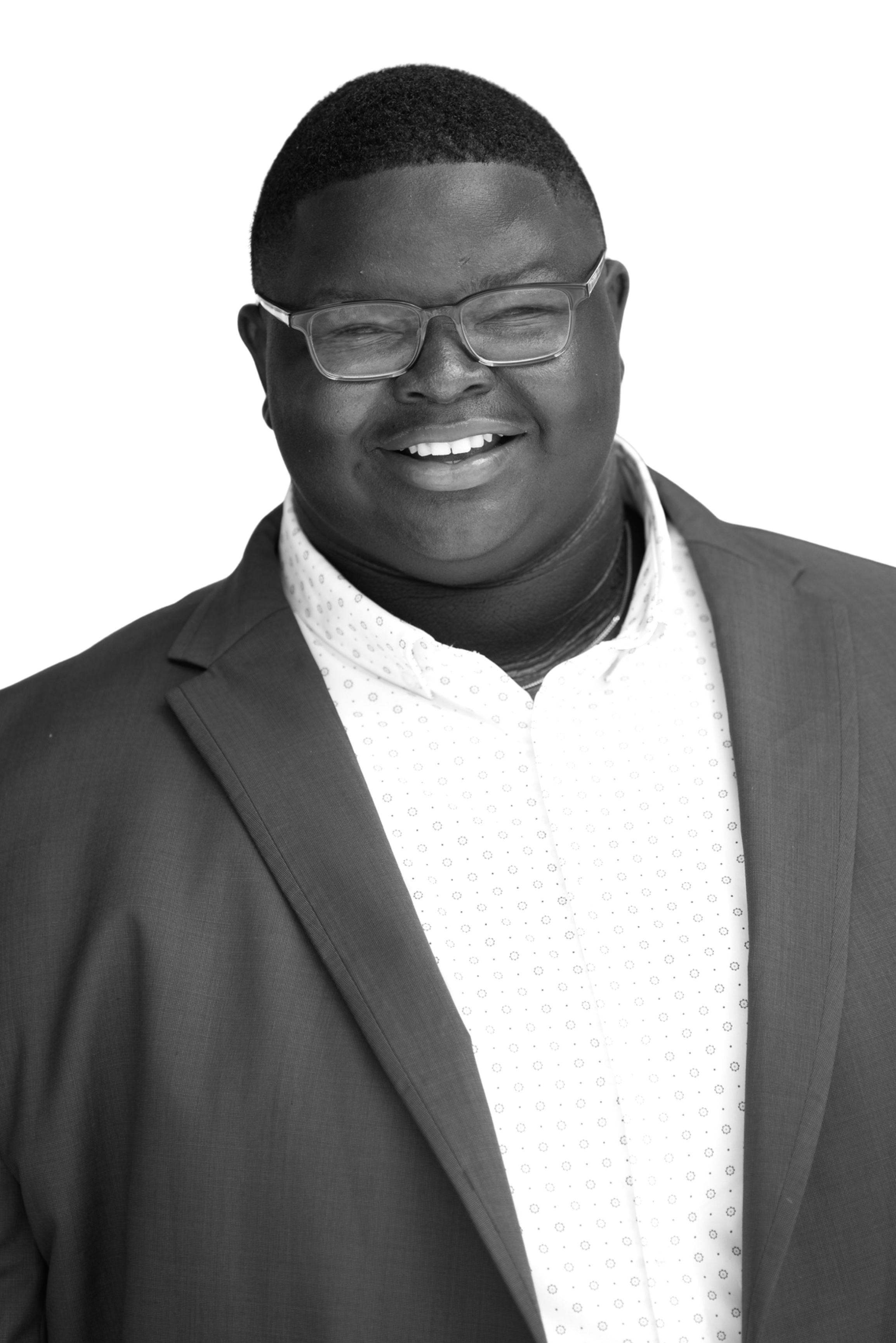 Black & white headshot of Eltavious Johnson.
