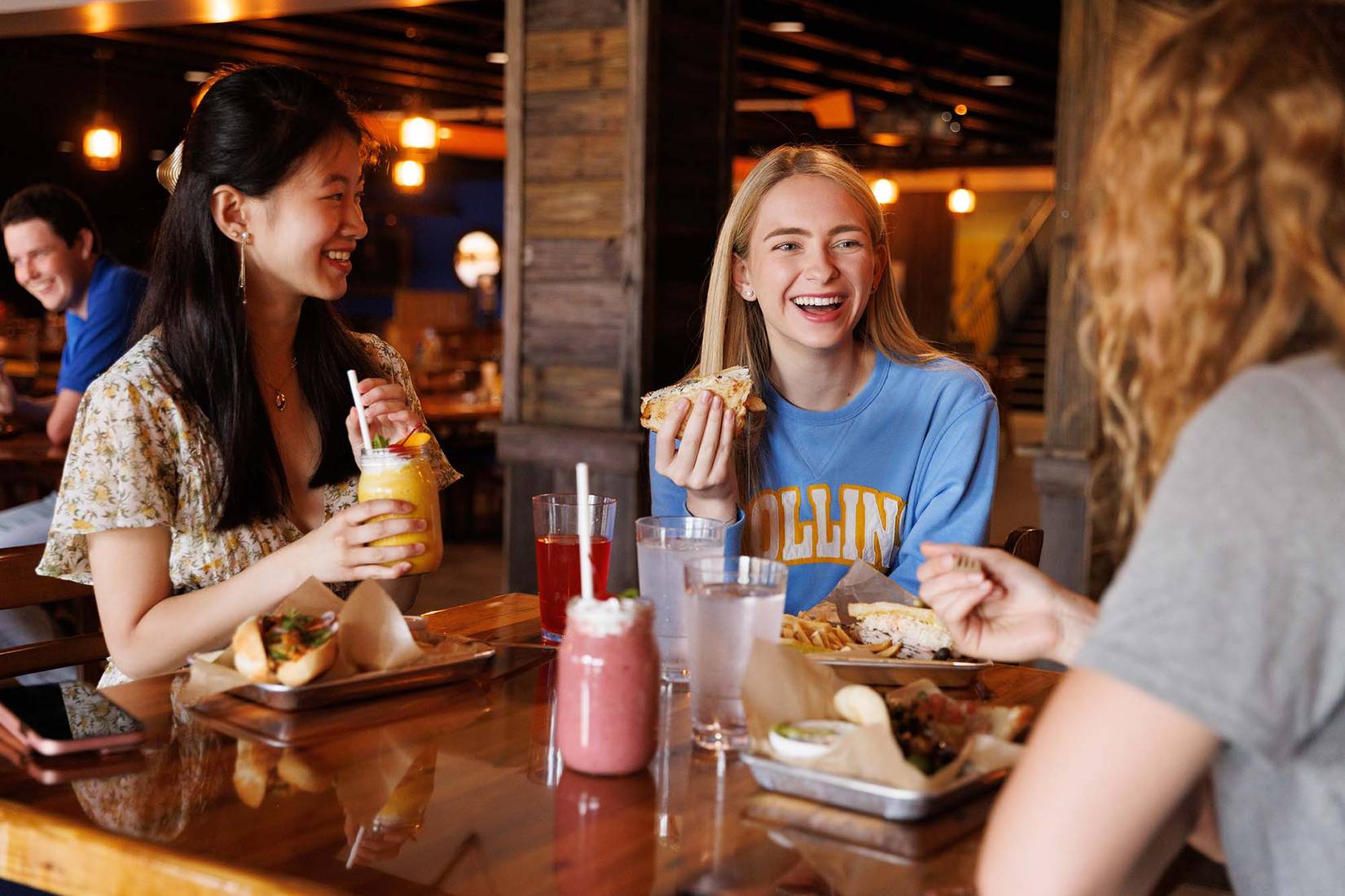 Students enjoy a meal at Dave's Boathouse