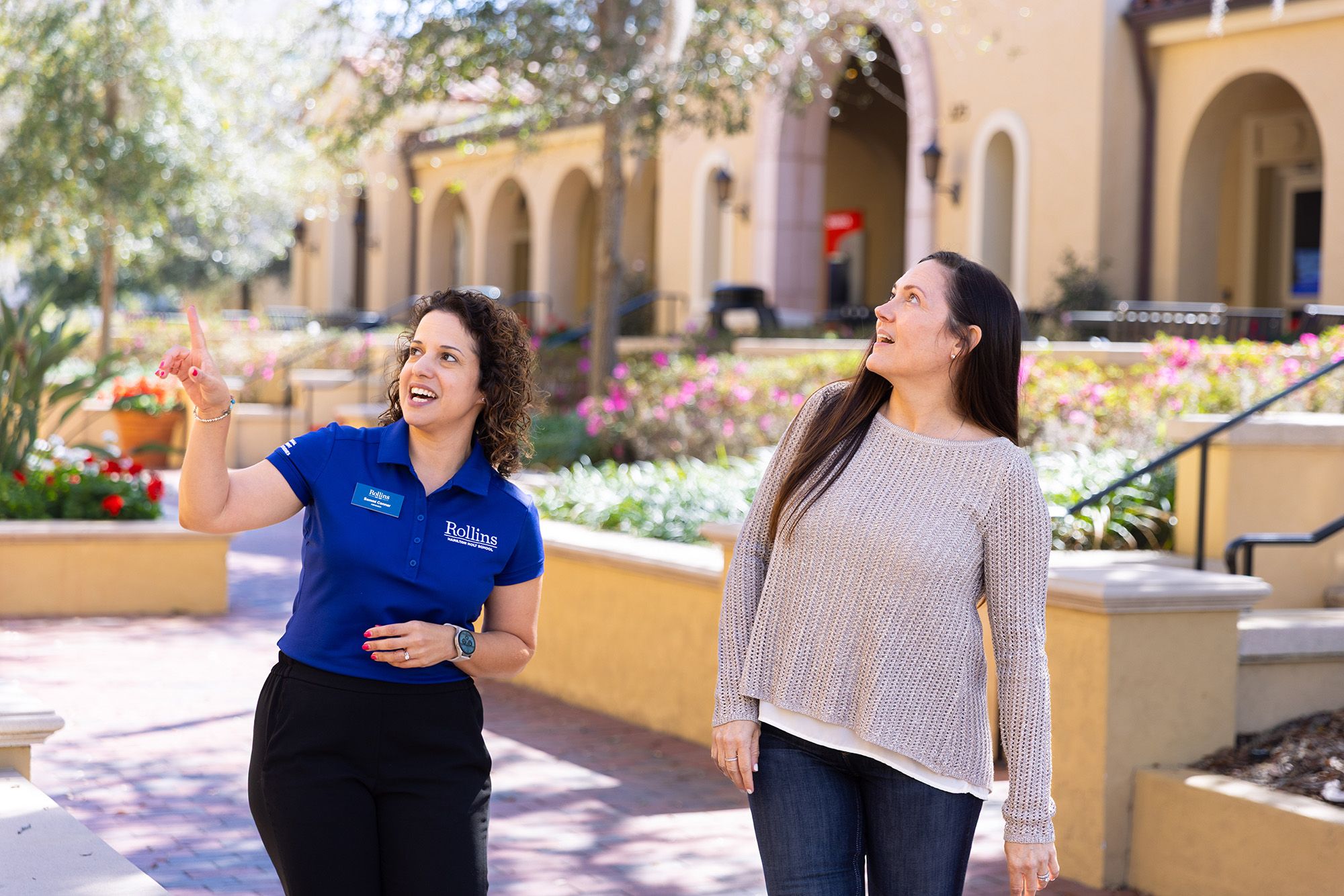 An admission counselor takes a prospective student on a tour of the Rollins campus.