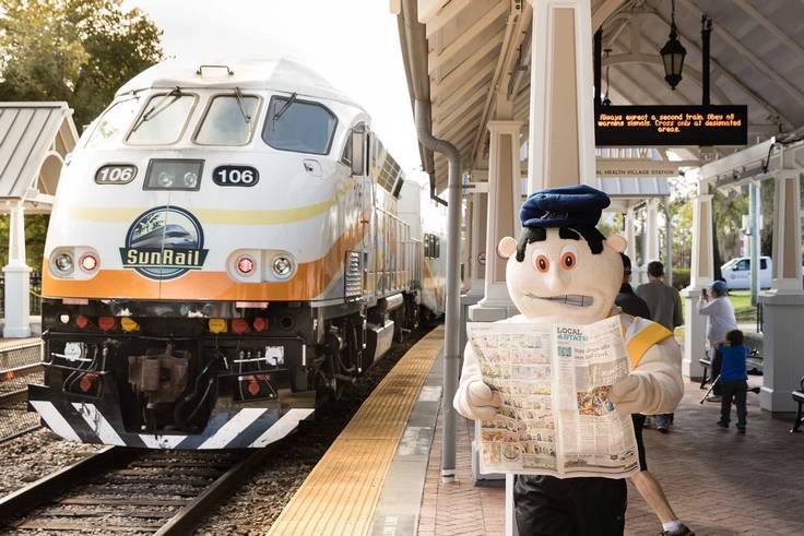 Tommy Tar waits for a SunRail train to arrive.