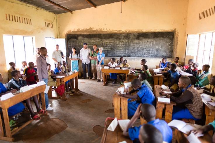 A group of Rollins student help teach in a classroom in Rwanda.