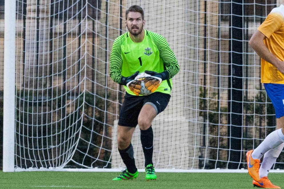 Julian Grundler as a goalie for Rollins' soccer team.