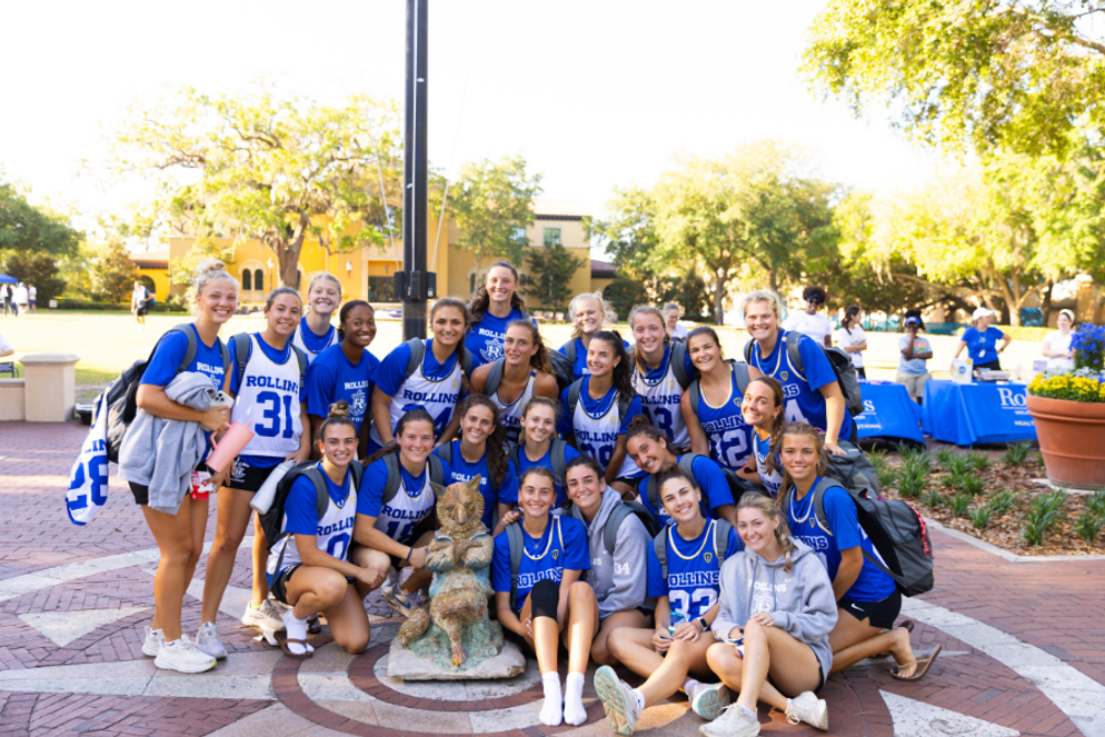 Student-athletes posing with the Fox