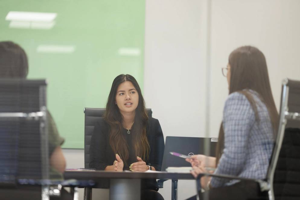 A student meets with her internship advisor 
