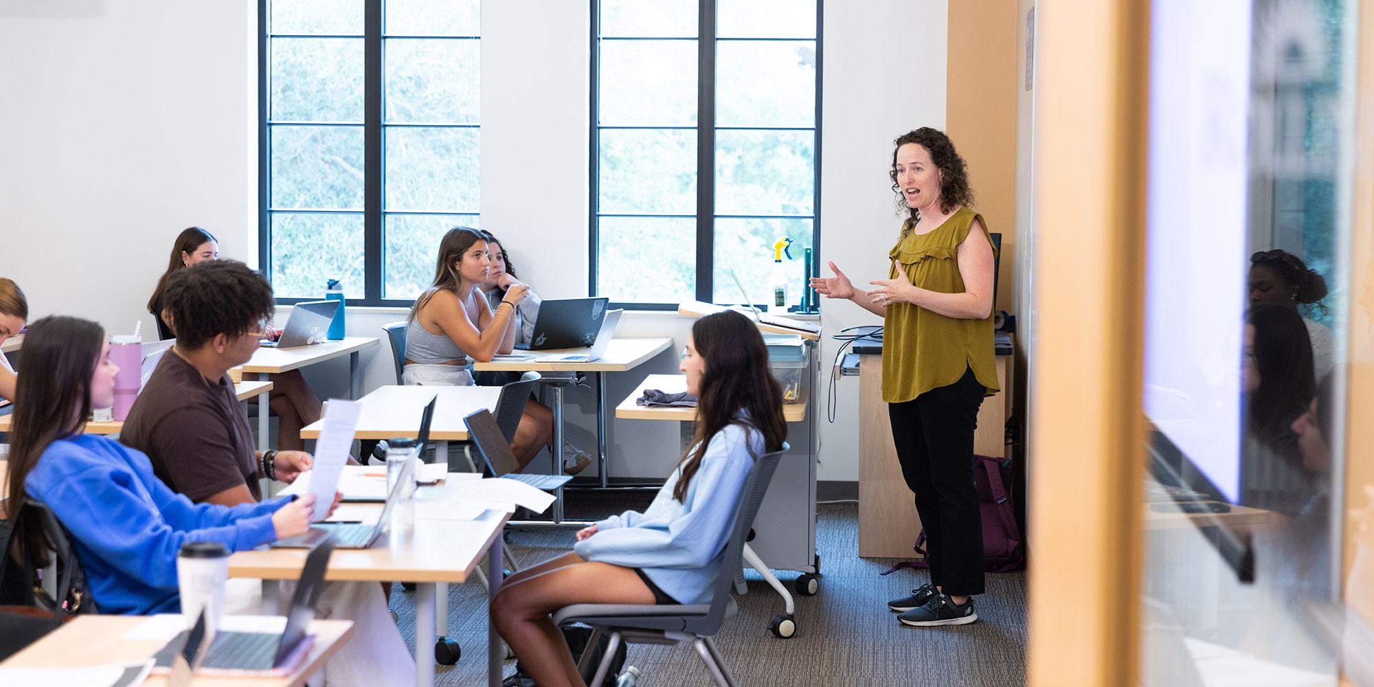 Students test their peers in a psychology class.