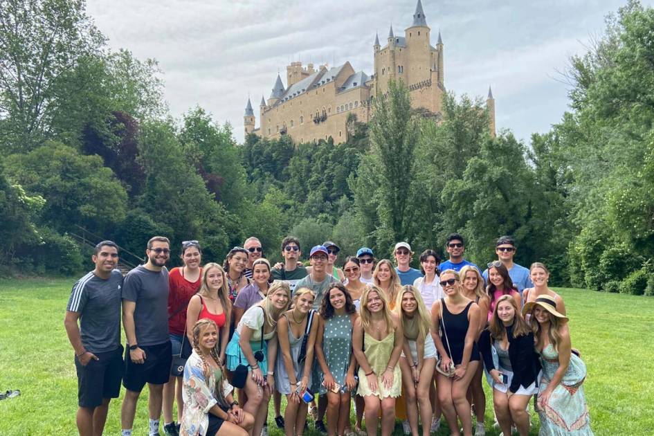 A group of students pose for a photo in a study abroad experience in Madrid.