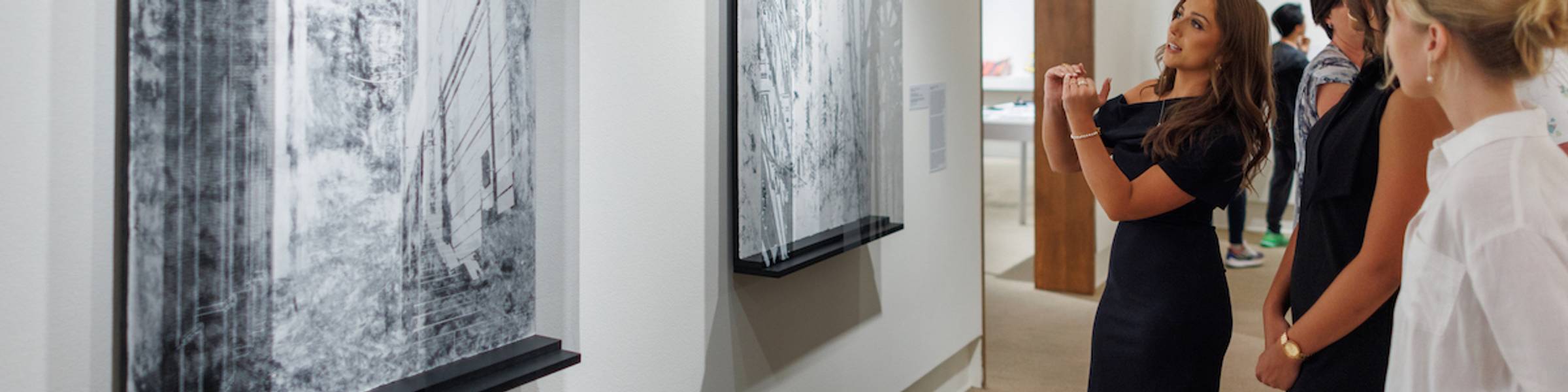 A group of Rollins students tour the Cornell Fine Arts Museum.