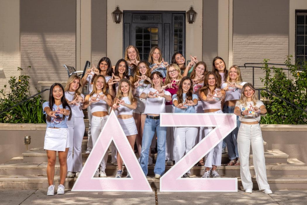 Delta Zeta Sorority sisters pose together outside their residence on Rollins campus.