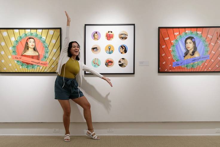 Melissa Rodriguez ’21 in front of her art exhibition at the Rollins Museum of Art. 