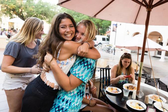 Two students hug to celebrate Fox Day.