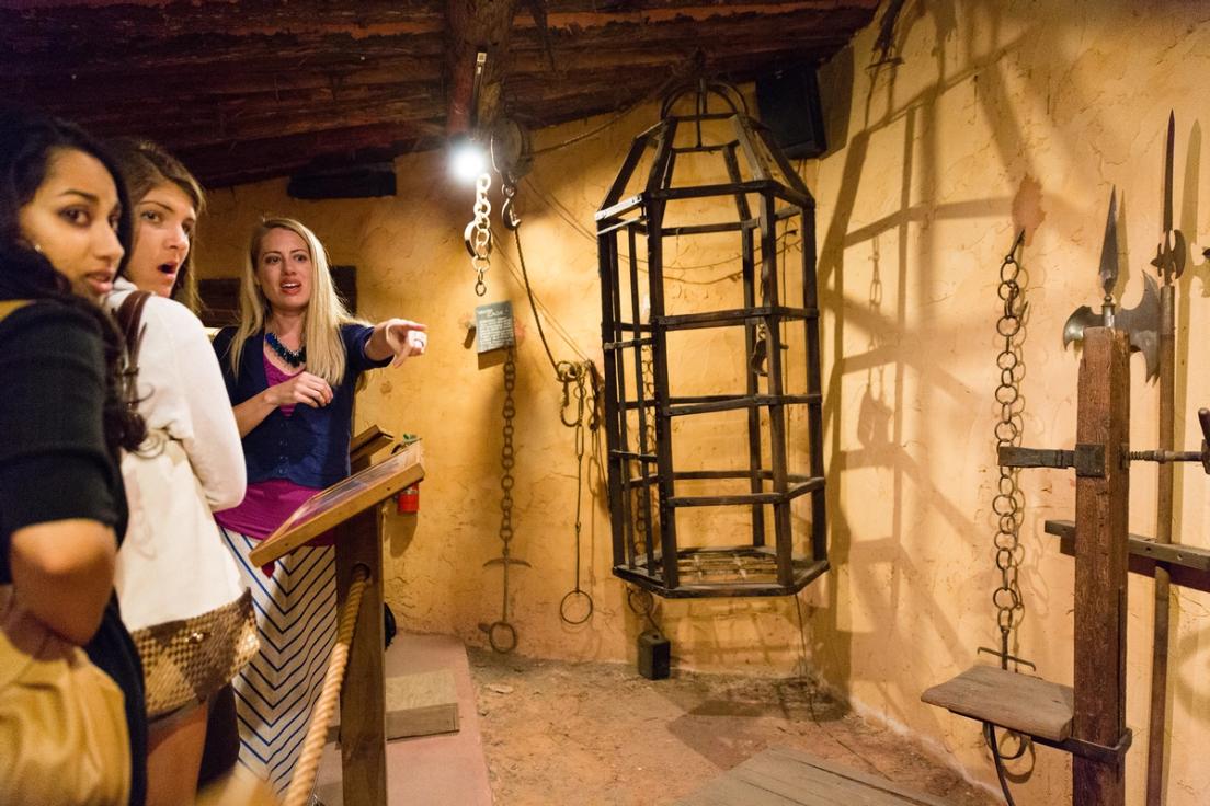 A professor and a group of students explore Medieval Times during a class trip.