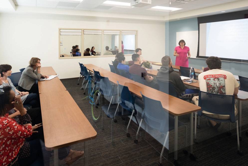 Psychology professor Sharon Carnahan holding class in the Child Development & Student Research Center at Rollins College.