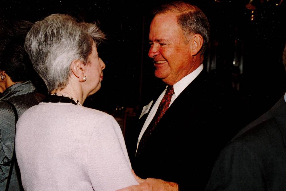 Harold Ward speaking with former Rollins president Rita Bornstein.