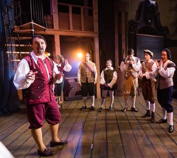 Theatre professor David Charles directing students in a Shakespeare production.