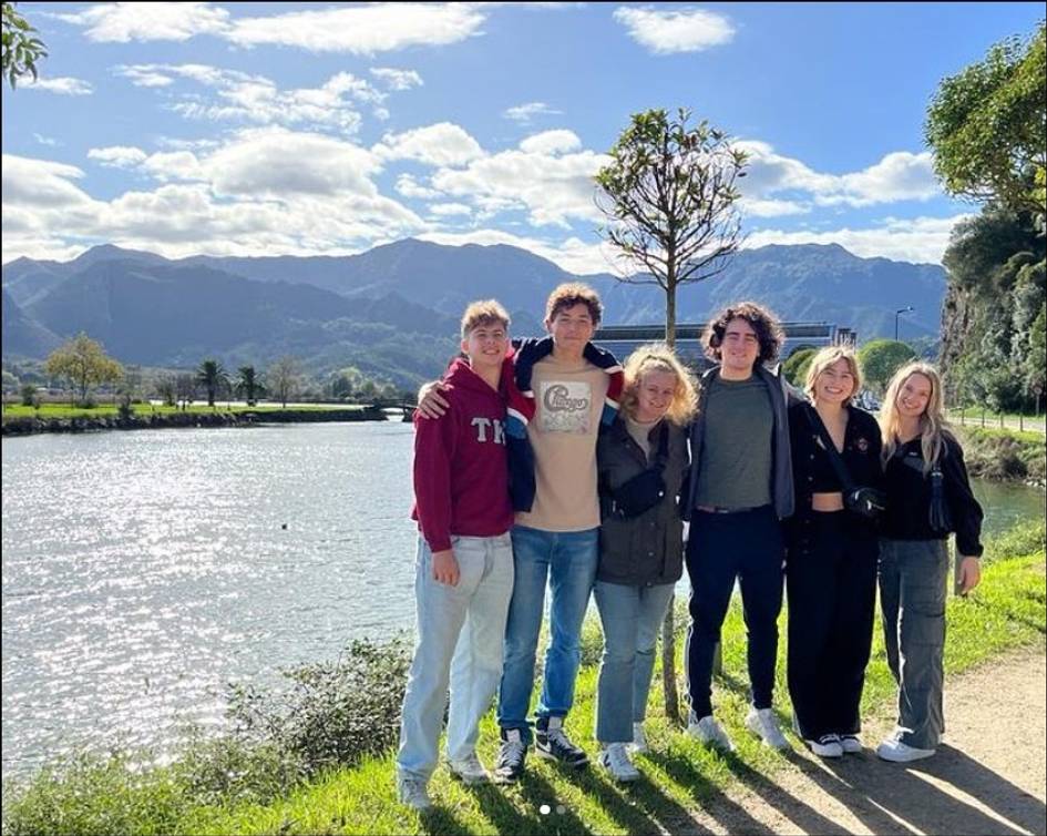 Students in front of a lake in Oviedo, Spain