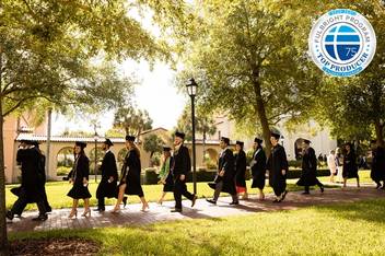 Students walk in Rollins' commencement ceremony