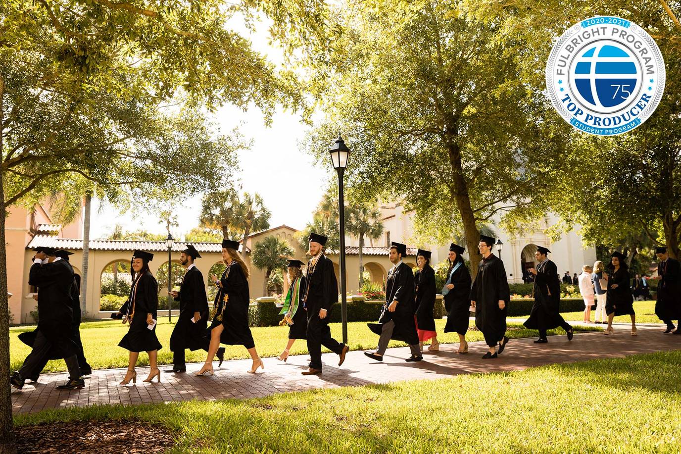 Students walk in Rollins' commencement ceremony