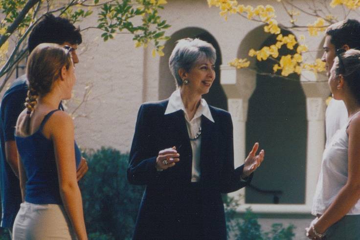 Rita Bornstein engaging with Rollins students on campus.