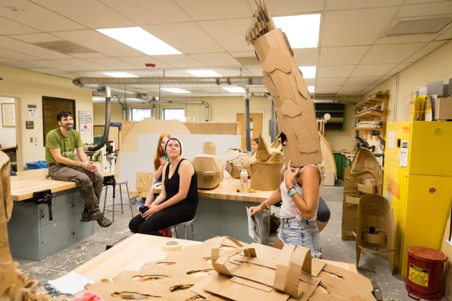 A student wearing a giraffe hat.