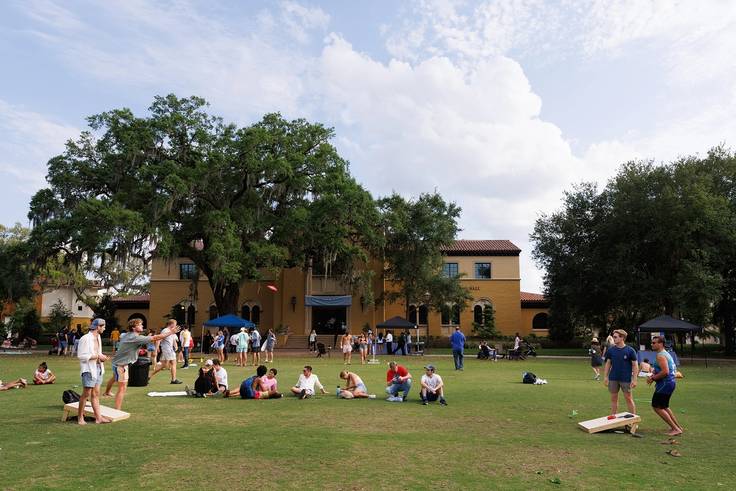 Students playing lawn games on Fox Day.