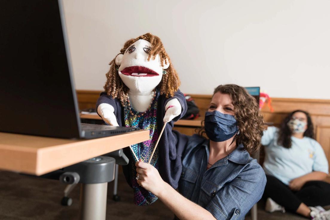 Instructor Sarah Parsloe poses with a puppet