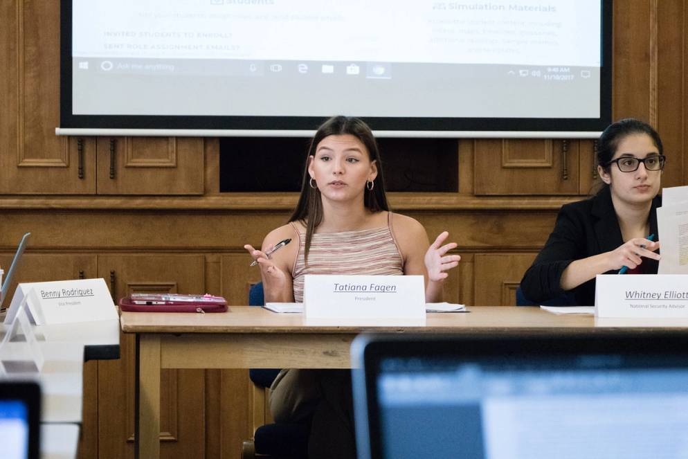 Rollins student presiding over a Model UN.