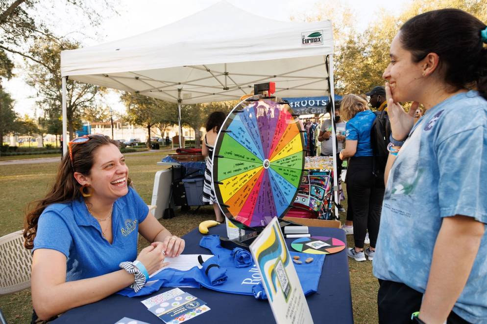 Student meets with a community partner on campus.