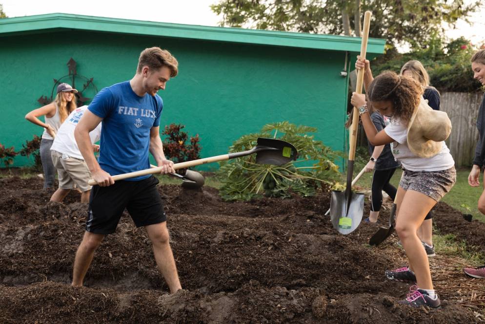 Students turning residential lawns into urban micro-farms.