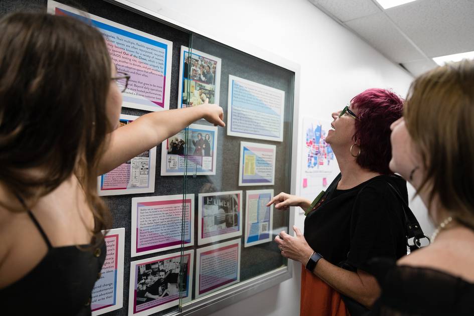 Rollins College students present a LGBTQ+ history display.