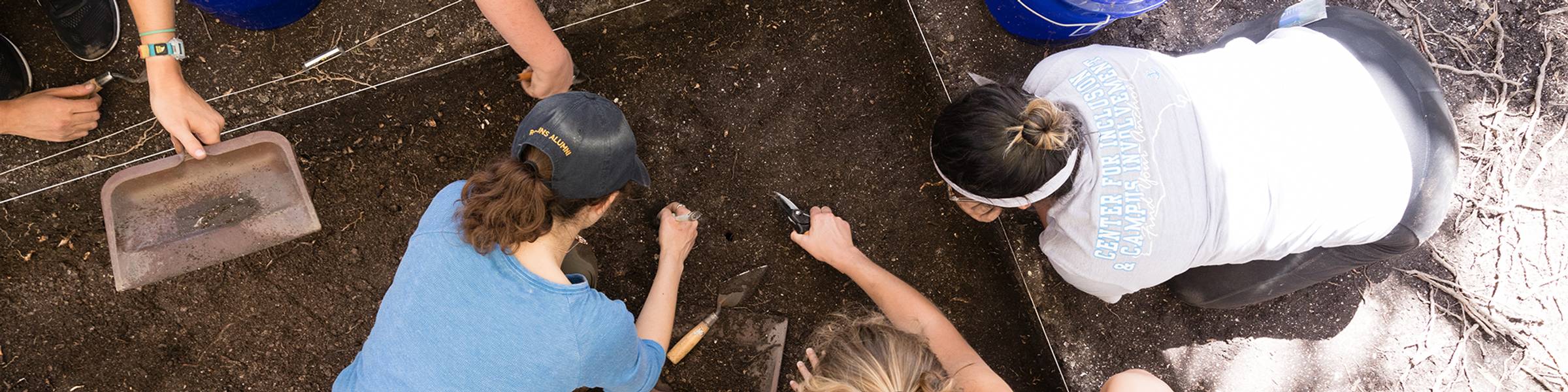 A professor and students excavate a dig site near Rollins’ campus.