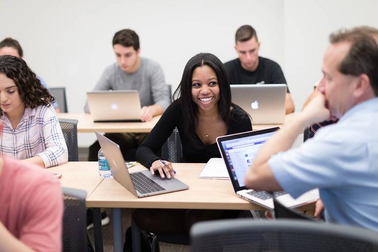 Rollins students hard at work in class.