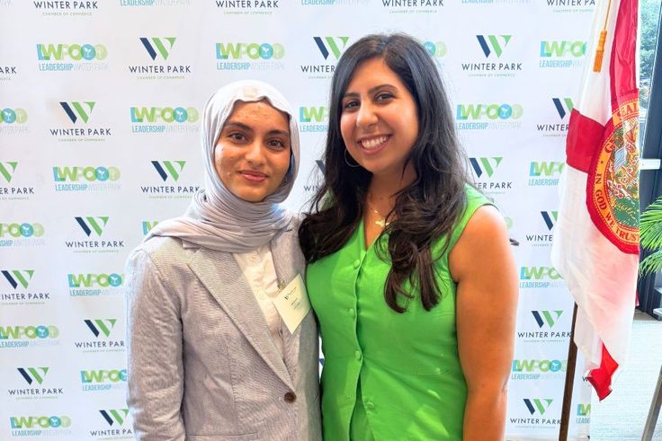 Irteza ’27 with Rep. Anna Eskamani pose at a Winter Park leadership event