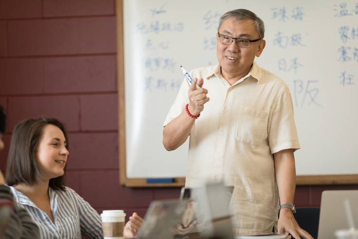 A Rollins professor leads an Asian studies class. 