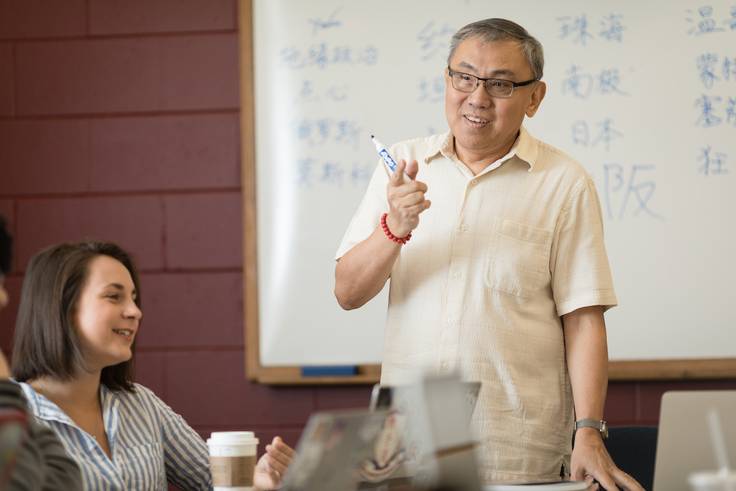 A Rollins professor leads an Asian studies class.