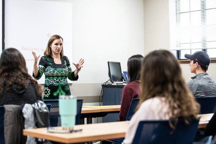 Anthropology professor Rachel Newcomb lectures students.