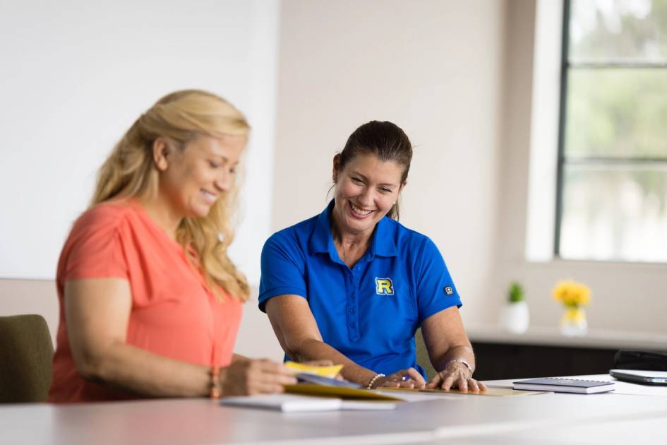 A Rollins admission counselor meets one-on-one with a potential student.