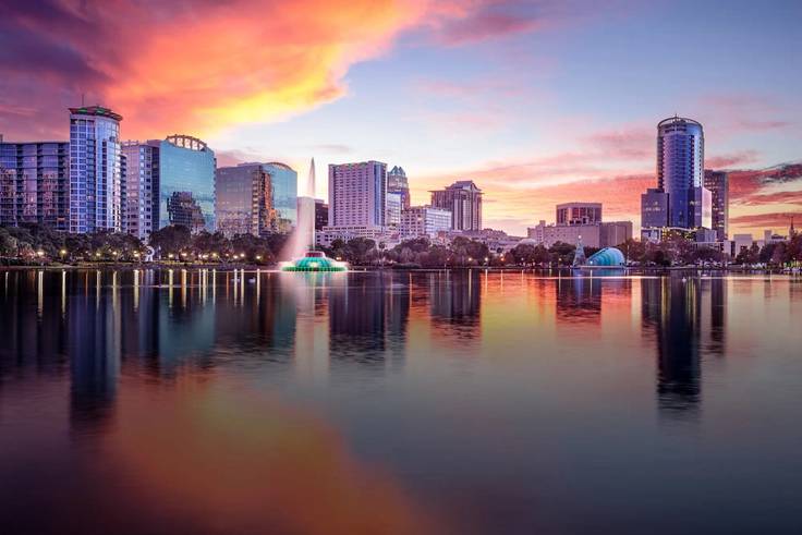 A sunset over Lake Eola in downtown Orlando.