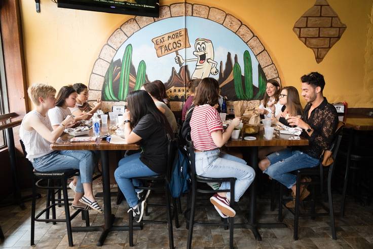 Students eat at Gringos Locos in downtown Orlando.