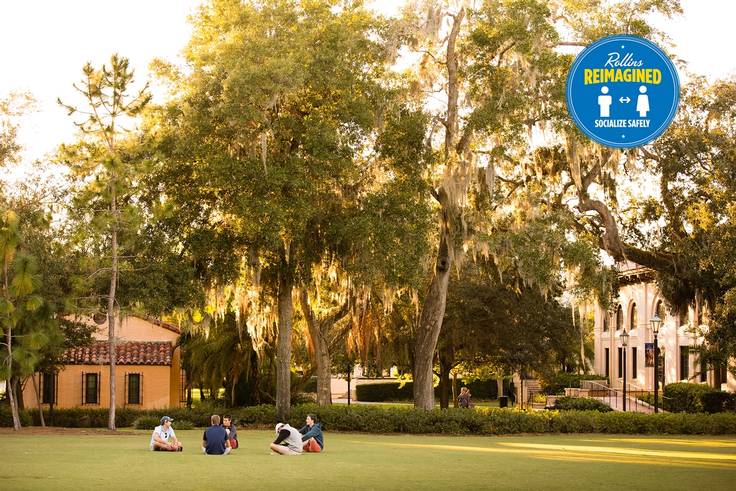 Students socializing on Mills Lawn.