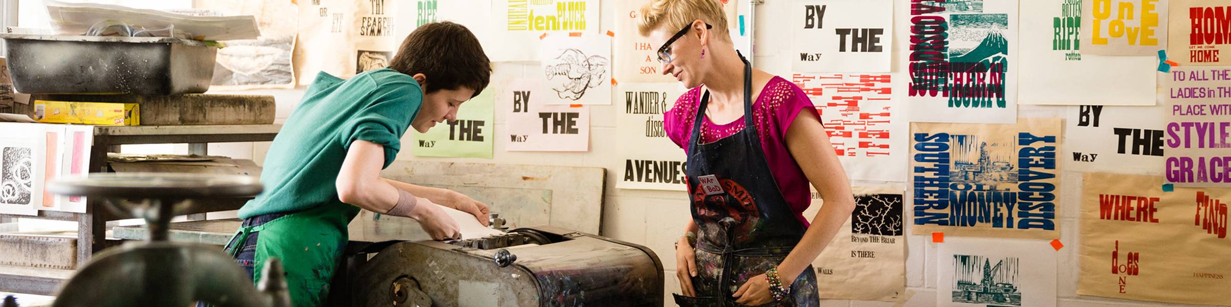 Studio art majors in a printmaking studio.