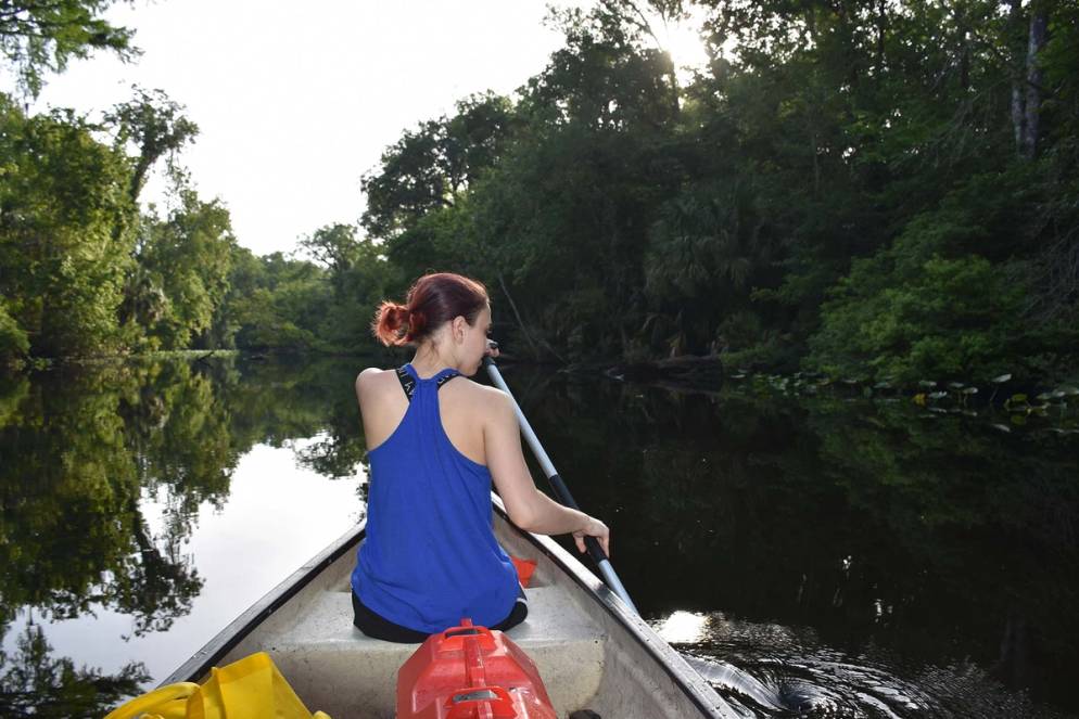 Zoe Millburn paddles out to Shell Island