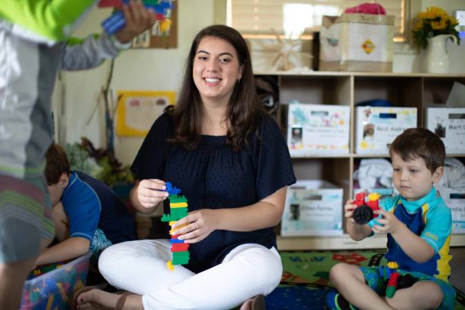 Alexandria Tomkunas ’18 with building blocks