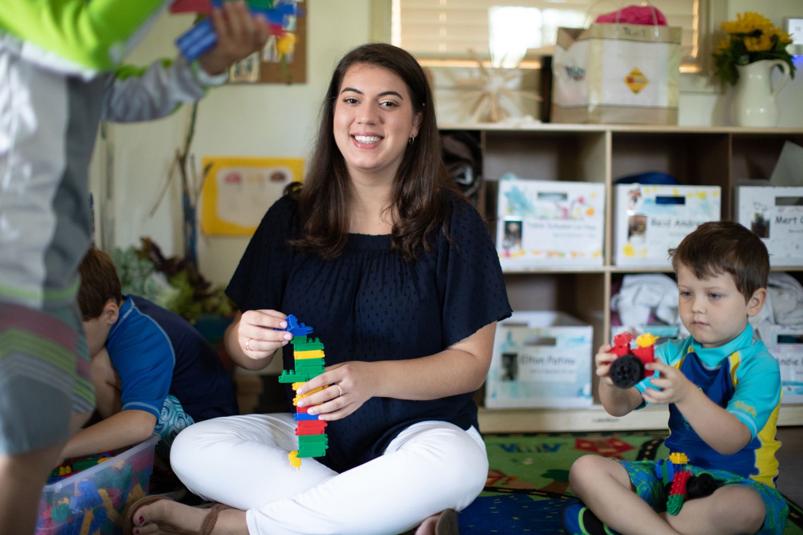 Alexandria Tomkunas ’18 with building blocks